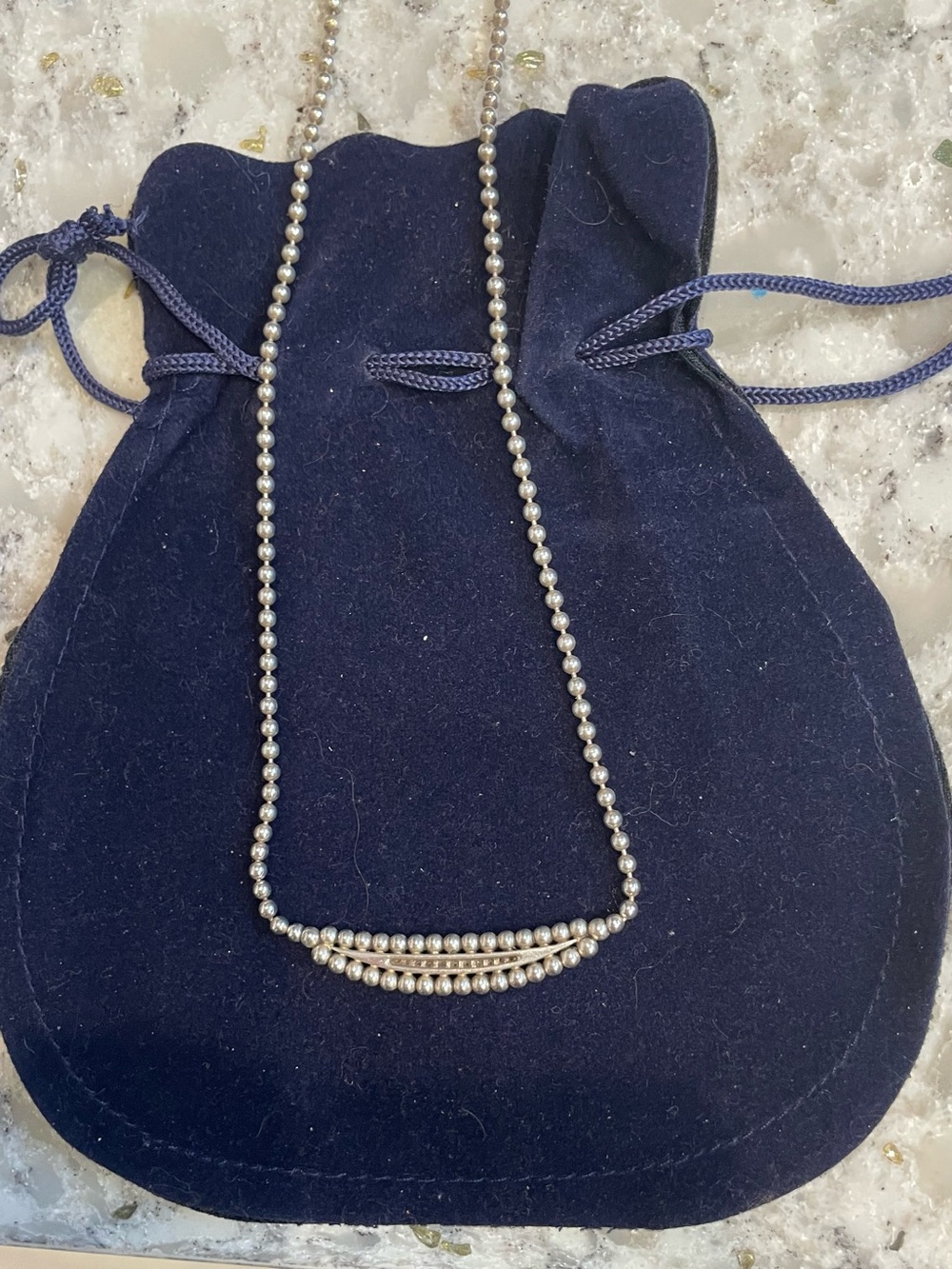 Silver Bead Layered Bar Necklace on Navy Pouch
